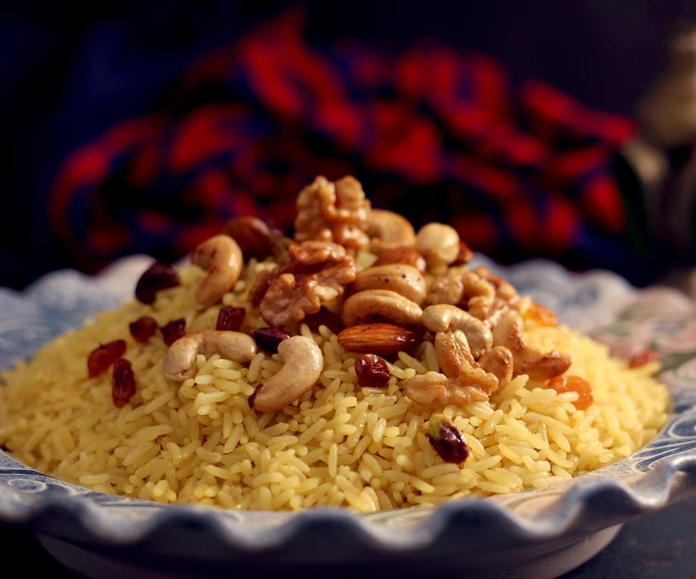 أحلى من المطاعم .. طريقة عمل الأرز البسمتي بالمكسرات بخطوات بسيطة 5 أحلى من المطاعم .. طريقة عمل الأرز البسمتي بالمكسرات بخطوات بسيطة