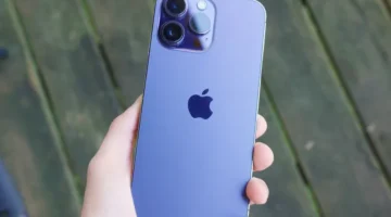 apple iphone 14 pro max purple back holding