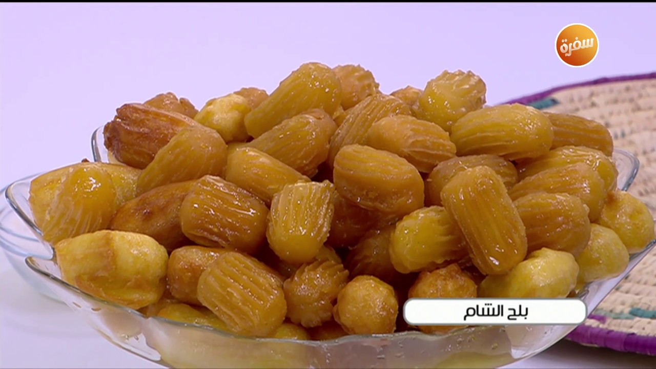 طريقة عمل بلح الشام المقرمش في البيت بأسرار وتكات الحلواني 5 طريقة عمل بلح الشام المقرمش في البيت بأسرار وتكات الحلواني