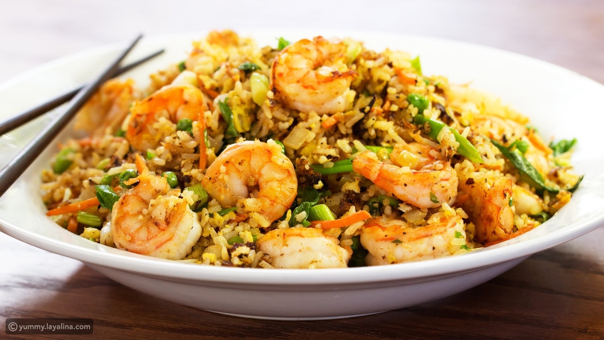 “بطعم لذيذ وشهي” طريقة عمل الأرز بالجمبري بالخطوات والصور
