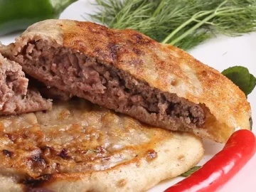 مثل الجاهز.. طريقة عمل الحواوشي البيتي بالعجينة والعيش البلدي
