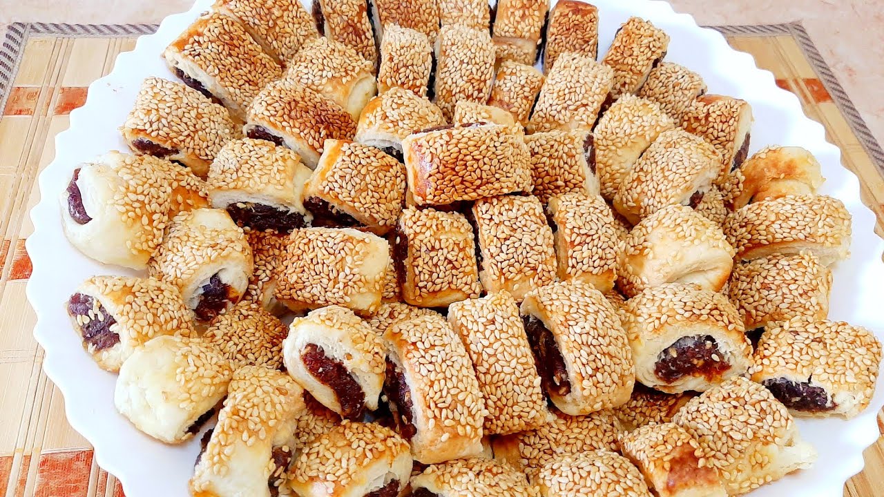 حضري المنين بالعجوة الناعم في البيت بنفس الطعم والشكل الذي يباع في الأفران 5 حضري المنين بالعجوة الناعم في البيت بنفس الطعم والشكل الذي يباع في الأفران