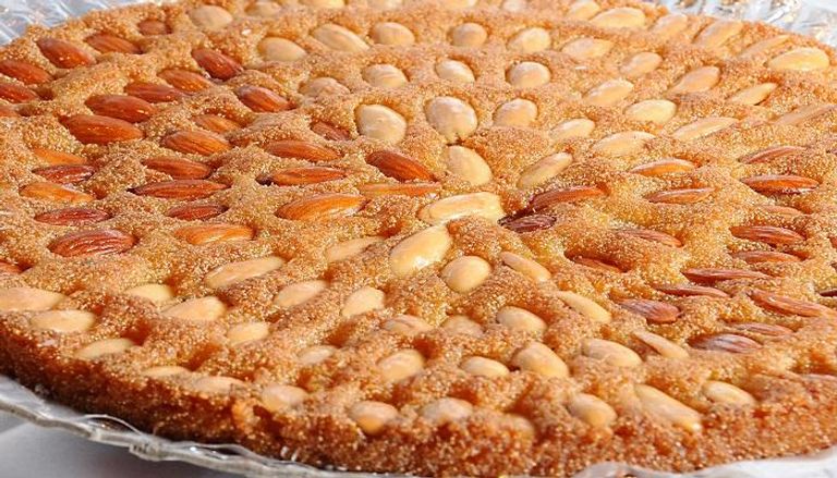 بدل ما تعجنيها في الخلاط واضربيها أسهل طريقة لعمل البسبوسة