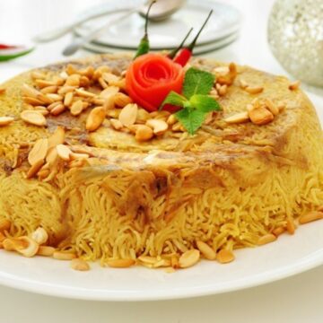 حضريه في دقائق..طريقة عمل أرز الصيادية بصلصة البقدونس وبطعم المطاعم الساحلية المحترفة الشهيرة