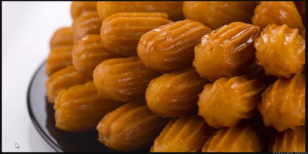 "زي المحلات" طريقة عمل بلح الشام في البيت هش وخفيف فى دقائق معدودة 5 “زي المحلات” طريقة عمل بلح الشام في البيت هش وخفيف فى دقائق معدودة