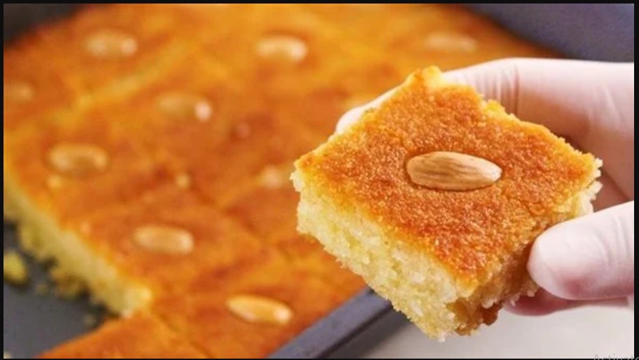 بسبوسه الحلواني بجد عجباني.. بلونها وطعمها وترميلتها مستحيل تنشف منك تاني وكمان اقتصادية بالطريقه دي زي المحلات 5 بسبوسه الحلواني بجد عجباني.. بلونها وطعمها وترميلتها مستحيل تنشف منك تاني وكمان اقتصادية بالطريقه دي زي المحلات