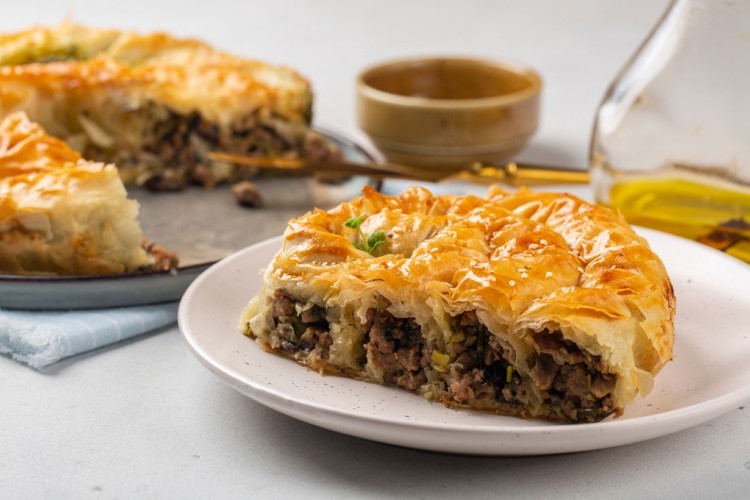 خطوة بخطوة.. طريقة عمل فطيرة الجلاش في الطاسة على أصولها