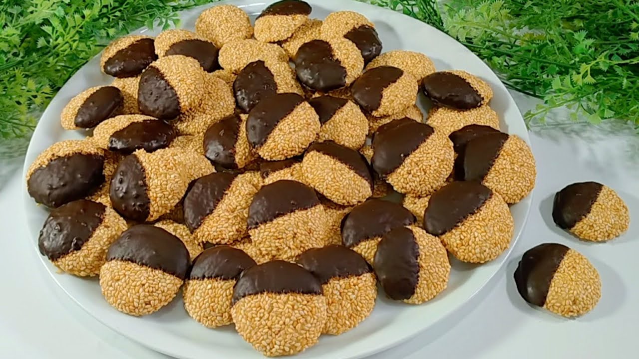 لو عندك سمسم وسوداني حضري أحلى بسكويت هش ومقرمش.. هيعجب أطفالك 5 لو عندك سمسم وسوداني حضري أحلى بسكويت هش ومقرمش.. هيعجب أطفالك