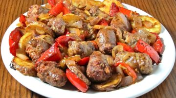 422927 طريقة عمل صينية البطاطس بالسجق 1