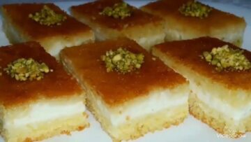 البسبوسة بالقشطة وصفة سهلة لتحضير حلوى الحلواني الشهيرة في المنزل بطعم خرافي