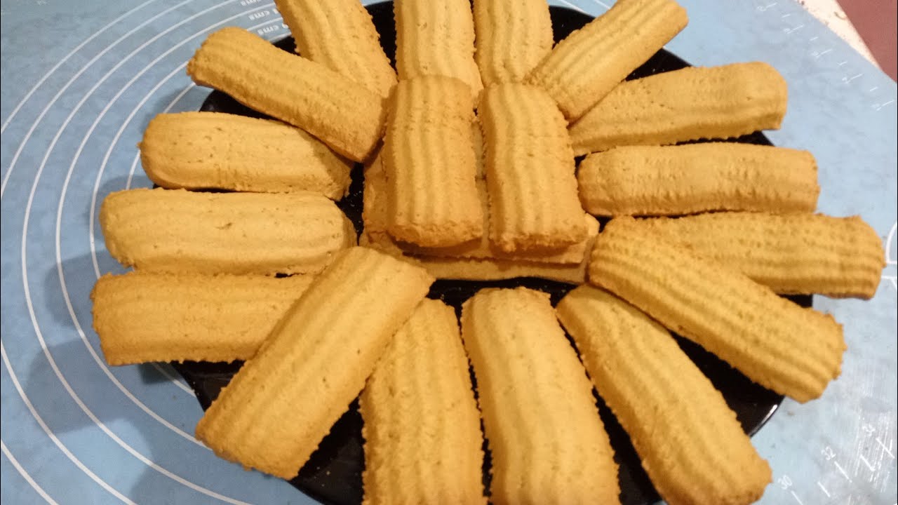 بعدد 4 بيضات.. طريقة عمل بسكويت العيد بالنشادر أو البرتقال والعجمية لاستقبال الضيوف 5 بعدد 4 بيضات.. طريقة عمل بسكويت العيد بالنشادر أو البرتقال والعجمية لاستقبال الضيوف