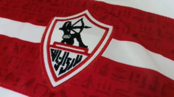 ق