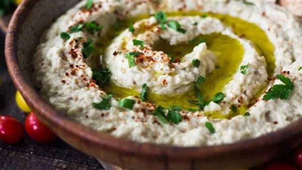 افتحي نفسك وأعملي بابا غنوج بالطحينة زي بتاعت المطاعم بتتبيلة الخل والثوم وبطعم ومذاق لذيذ