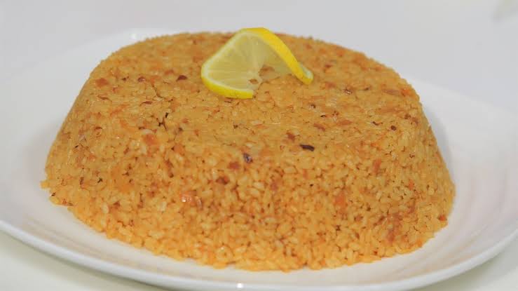 رز الصيادية زي ما الكتاب بيقول.. طريقة عمل أرز الصيادية مع السمك بطريقة احترافية مثل المطاعم