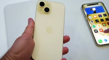 iphone 15 yellow in hnad