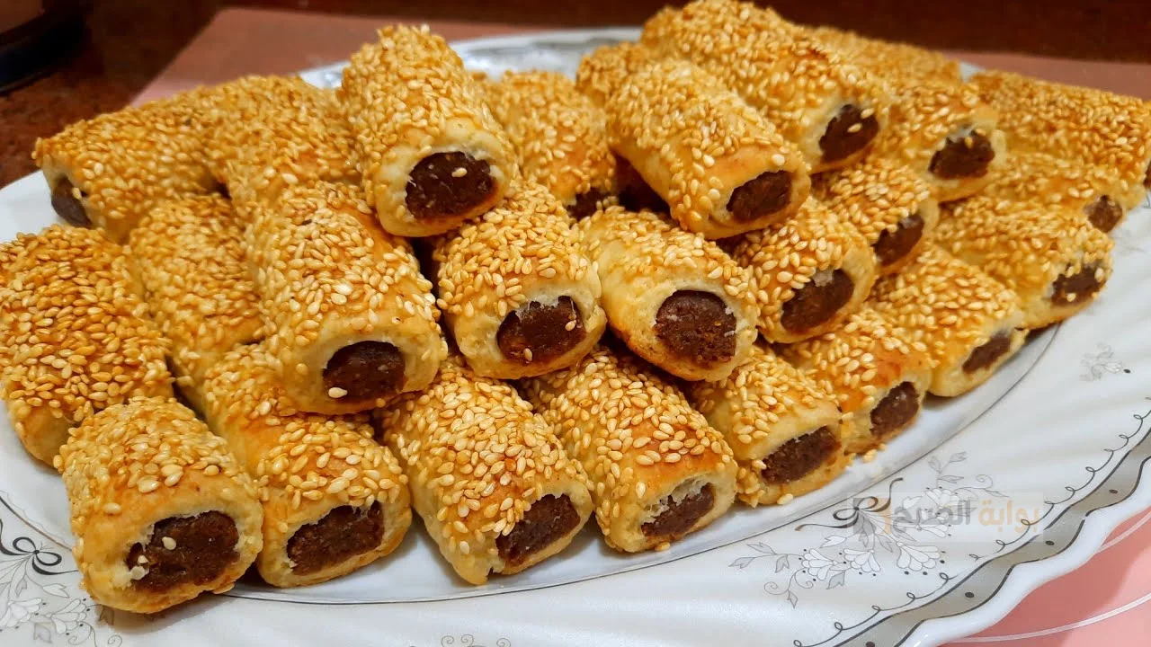 اعرفي معانا طريقة تحضير مخبوزات المنين بالسمسم قدميه مع شاي بلبن 5 اعرفي معانا طريقة تحضير مخبوزات المنين بالسمسم قدميه مع شاي بلبن