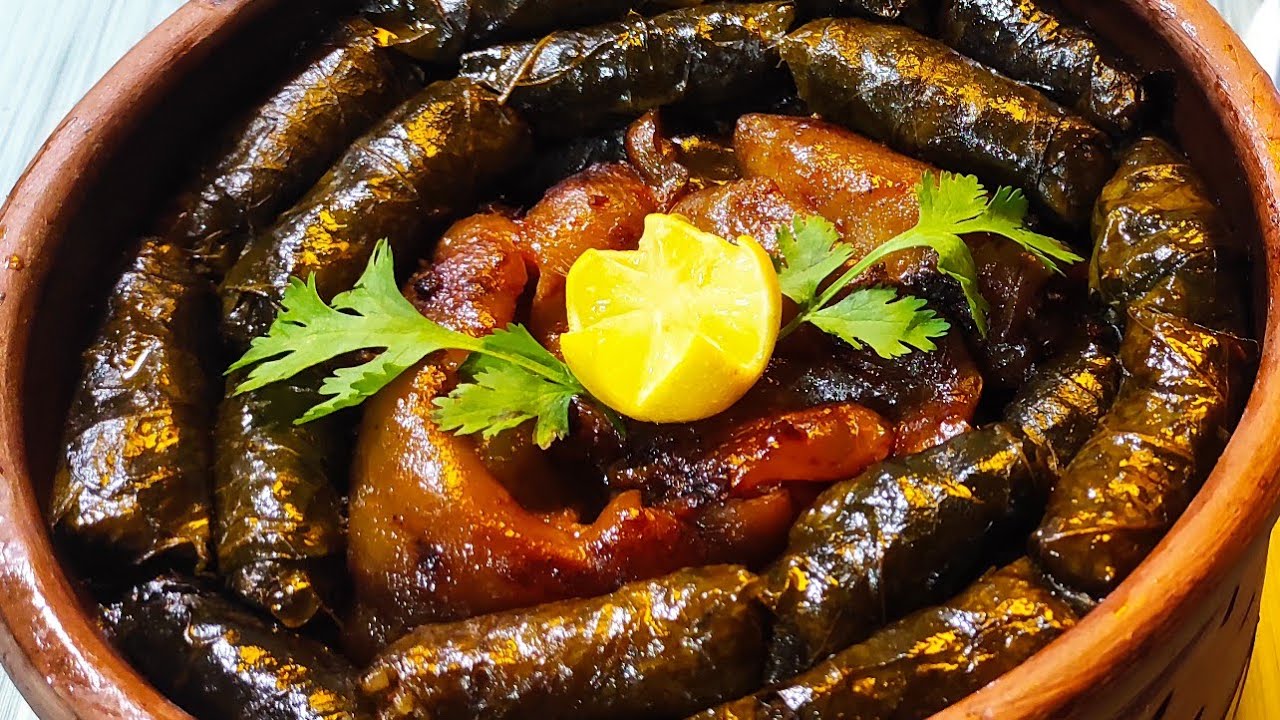 طريقة عمل طاجن ورق العنب بالكوارع بأسرار المطاعم الفاخمه 5 طريقة عمل طاجن ورق العنب بالكوارع بأسرار المطاعم الفاخمه