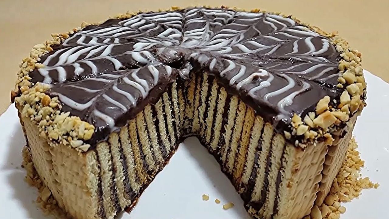 كيكة البسكويت البارد بالشوكولاتة زي النايتي بتاع زمان حضريها هتنفع معاكي في الحر 5 كيكة البسكويت البارد بالشوكولاتة زي النايتي بتاع زمان حضريها هتنفع معاكي في الحر