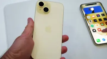 iphone 15 yellow in hnad