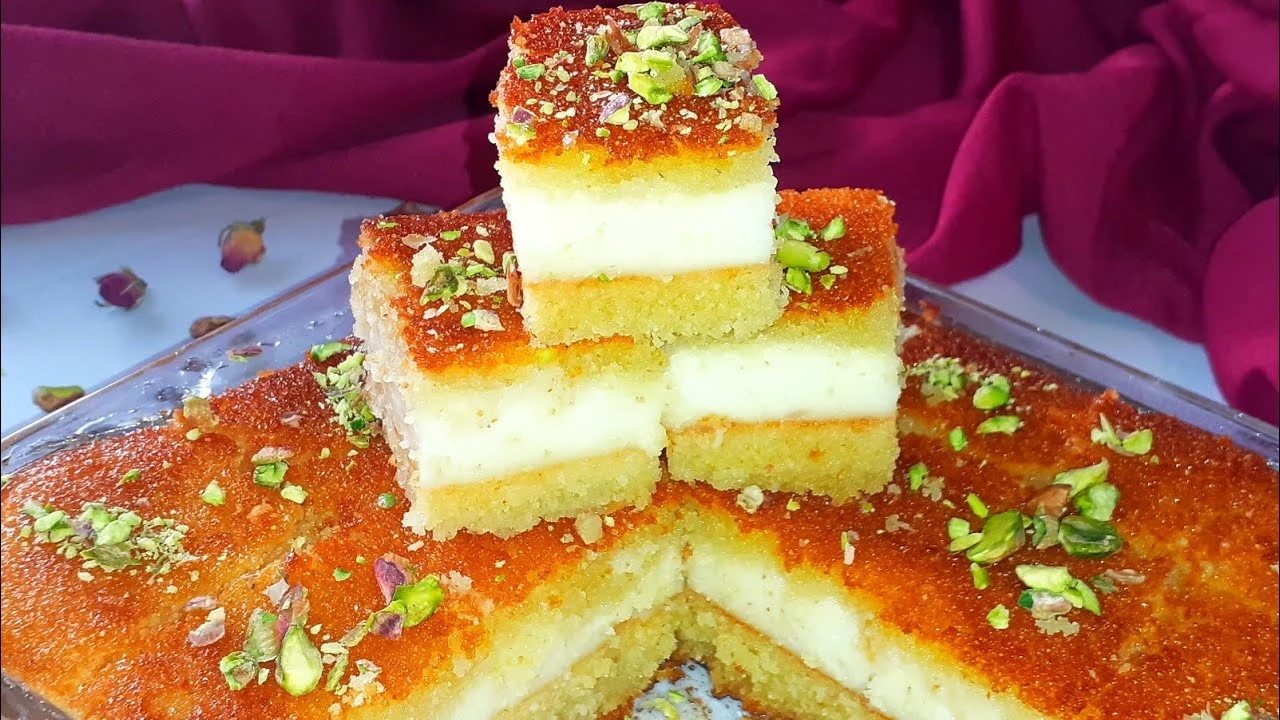 زي الجاهزة.. اعملي البسبوسة بالقشطة في المنزل بمكونات بسيطة وبأقل التكاليف