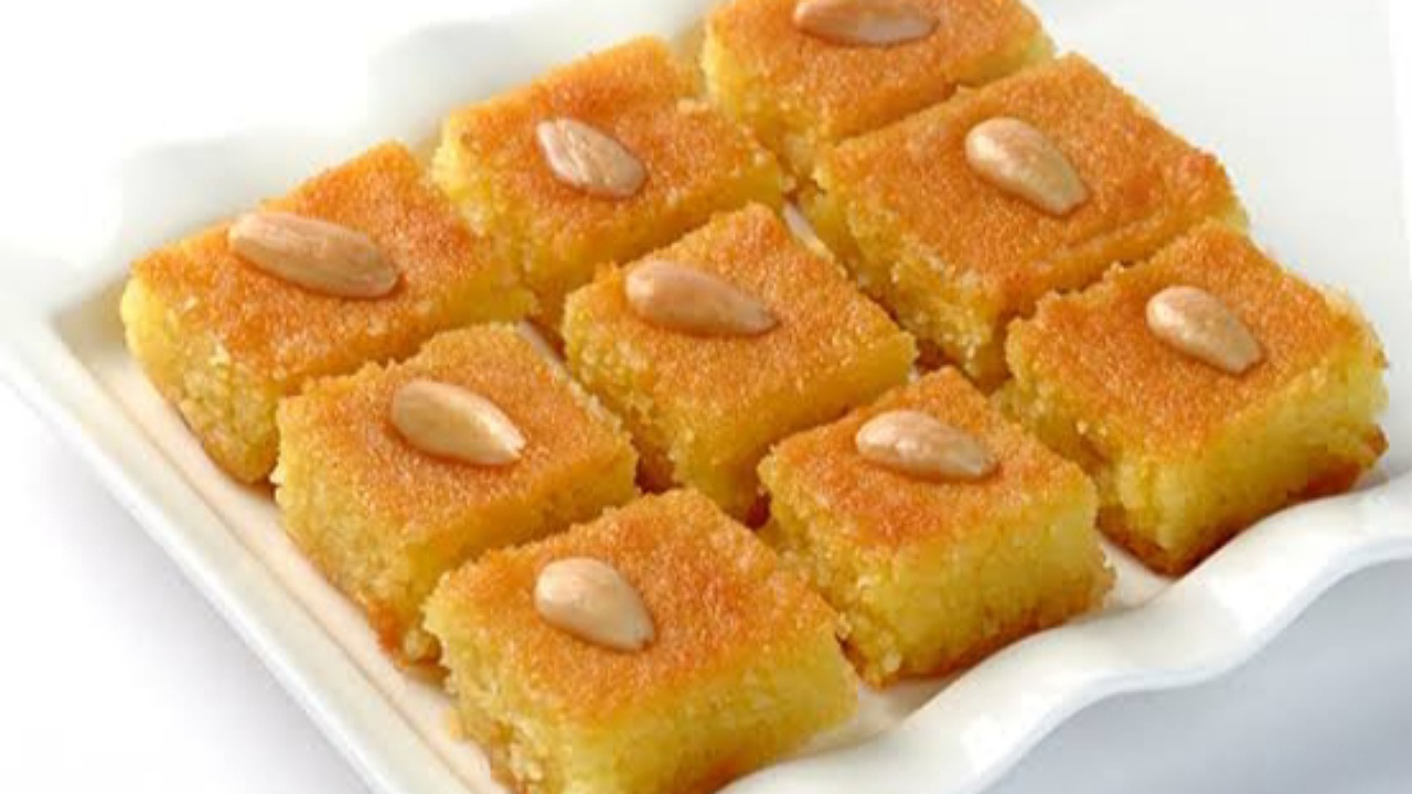طريقة عمل البسبوسة المرملة بأقل التكاليف في المنزل وأحلى من الحلواني بطعم ومذاق جميل 2 طريقة عمل البسبوسة المرملة بأقل التكاليف في المنزل وأحلى من الحلواني بطعم ومذاق جميل