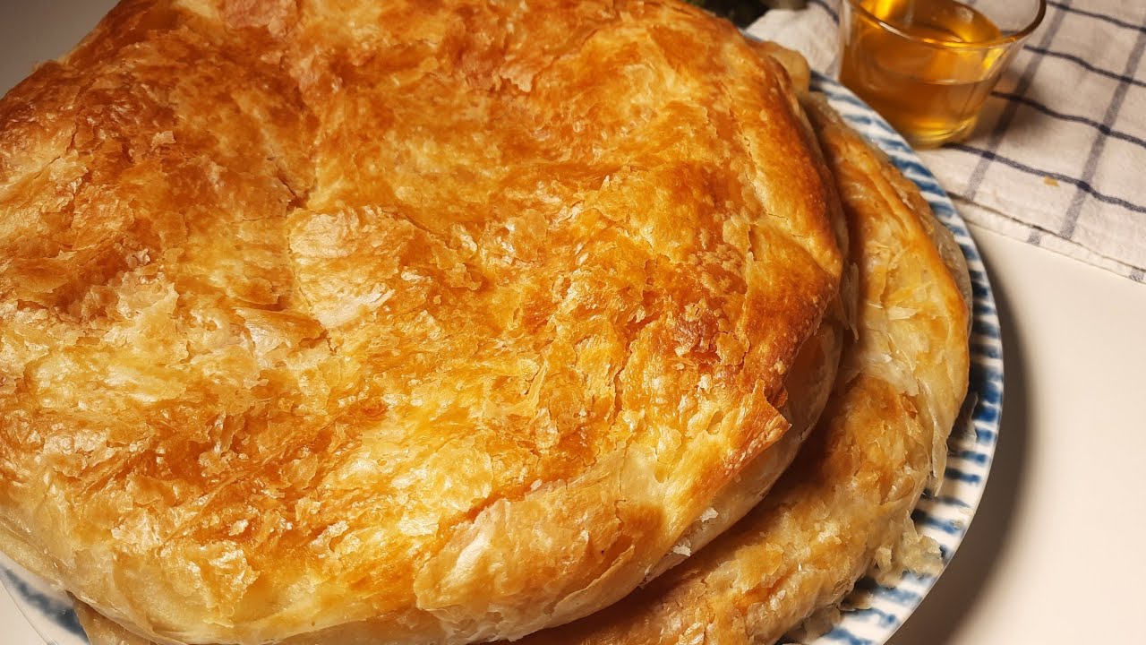 طري ومورق هتنبهري بجماله.. طريقة عمل الفطير المشلتت الفلاحي في البيت زي الجاهز وأحلى