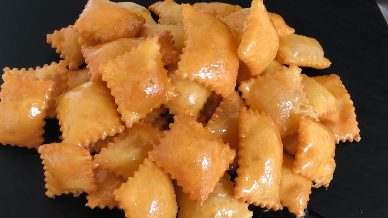 مكوناتها بسيطة وطعمها خرافي .. طريقة عمل البغاشة المقرمشة حلوى شرقية بطعم لا يُقاوم 5 مكوناتها بسيطة وطعمها خرافي .. طريقة عمل البغاشة المقرمشة حلوى شرقية بطعم لا يُقاوم