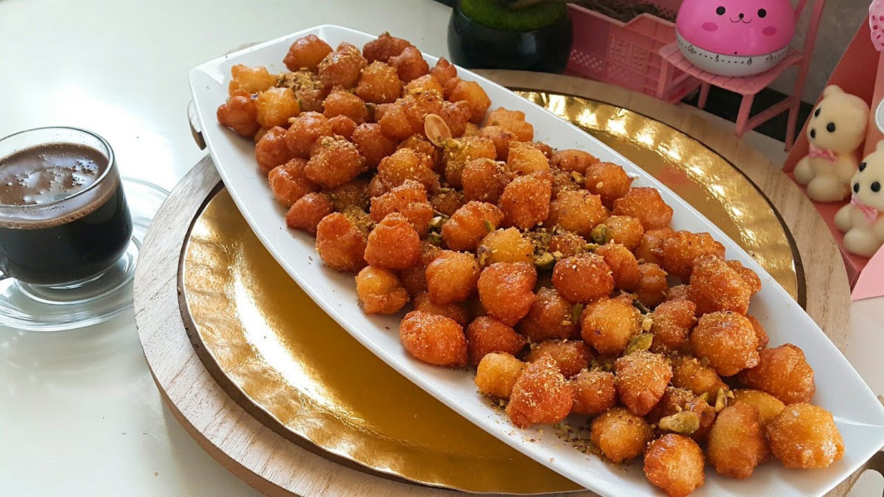 غرقانة في الشربات هتعمليها لأولادك كل يوم من حلاوتها حضري كرات السميد التركية بحشوة الجبن في المنزل