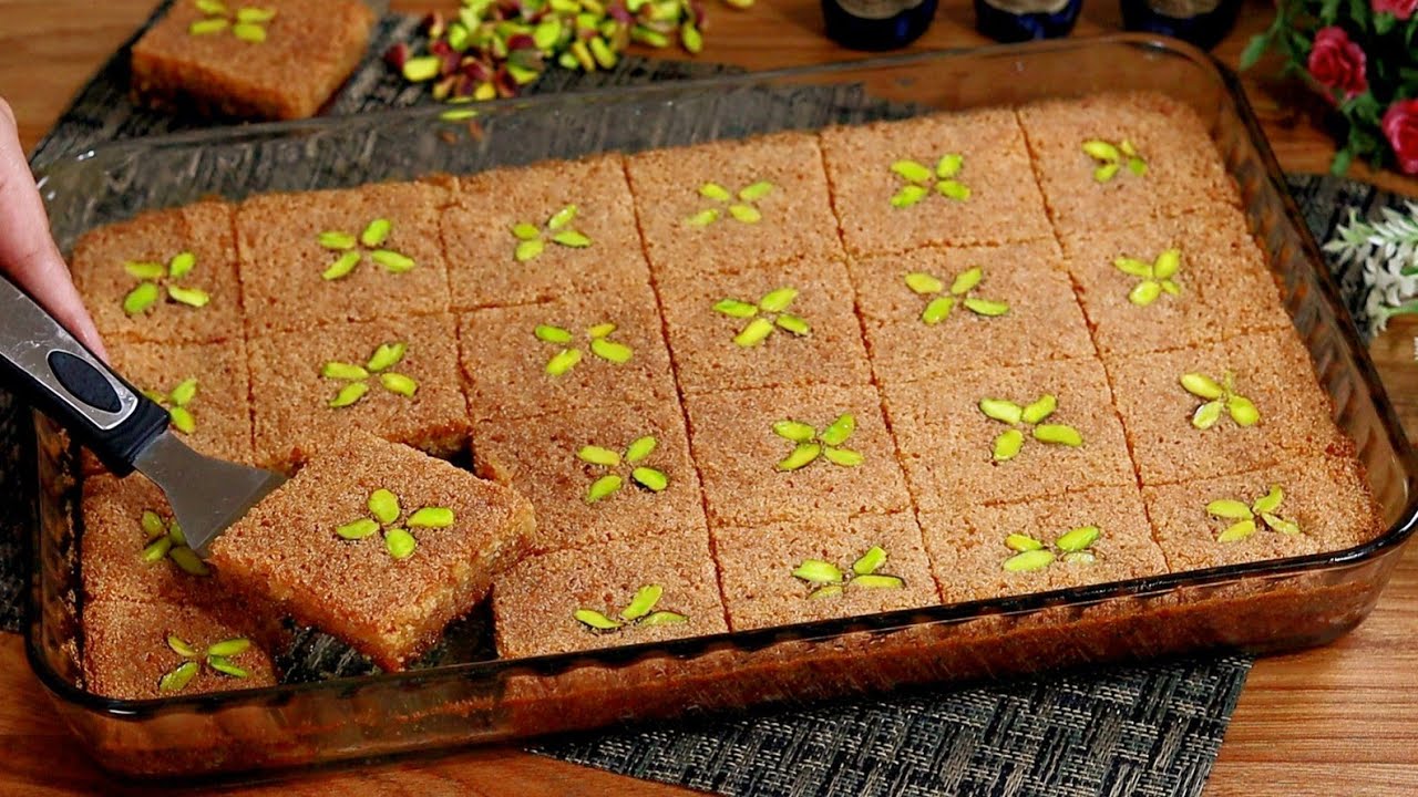 ألذ صنية بسبوسة يمكنك تحضيرها مثل الجاهزة في مطبخك.. طريقتين لتحضير البسبوسة 5 ألذ صنية بسبوسة يمكنك تحضيرها مثل الجاهزة في مطبخك.. طريقتين لتحضير البسبوسة