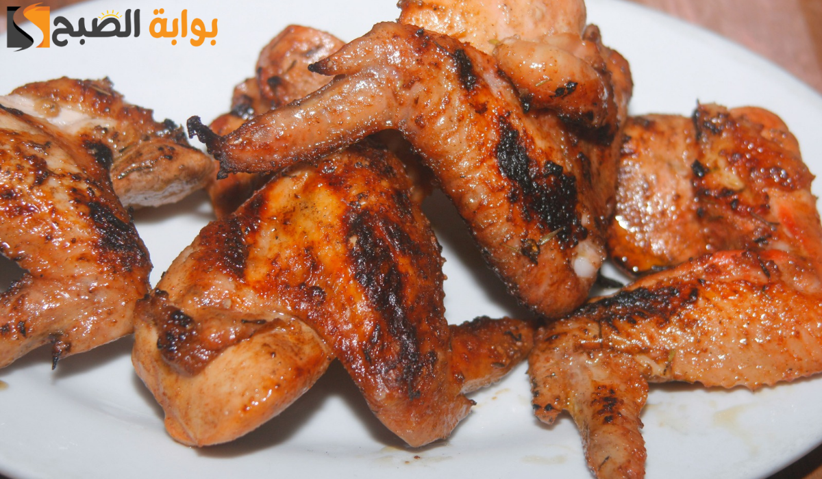 بكل سهولة حضري أجنحة الدجاج المشوية بالفرن بطعم وريحة زمان 2 بكل سهولة حضري أجنحة الدجاج المشوية بالفرن بطعم وريحة زمان