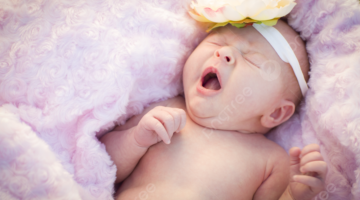 pngtree a gorgeous infant girl peacefully resting on a comfortable blanket photo picture image 7046035 1