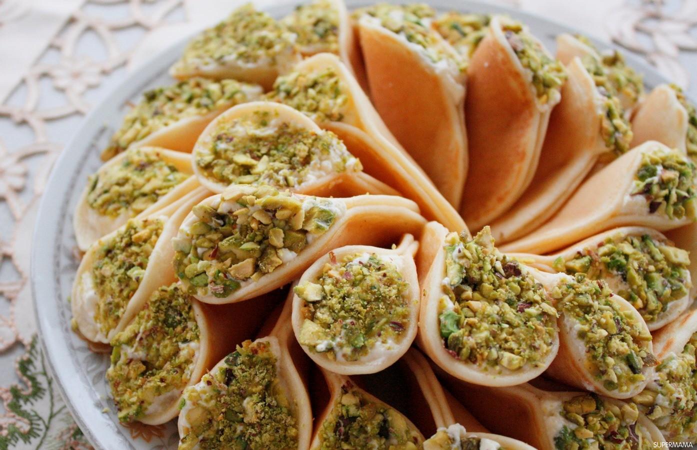 حضري ألذ قطايف بالقشطة في رمضان بخطوات سهلة وطعم يفوق المحلات 2 حضري ألذ قطايف بالقشطة في رمضان بخطوات سهلة وطعم يفوق المحلات